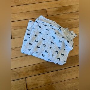Little Unicorn vehicle print muslin infant swaddle blanket